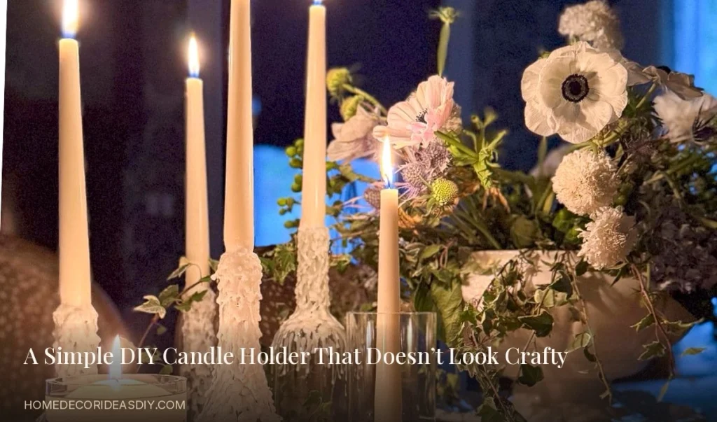 DIY candle holder made from bottles with dripping ivory taper candles on a dinner table.