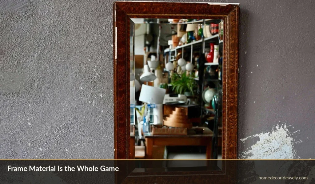 Solid wood framed Decor Steals Mirror on a plaster wall showing visible grain and real weight.
