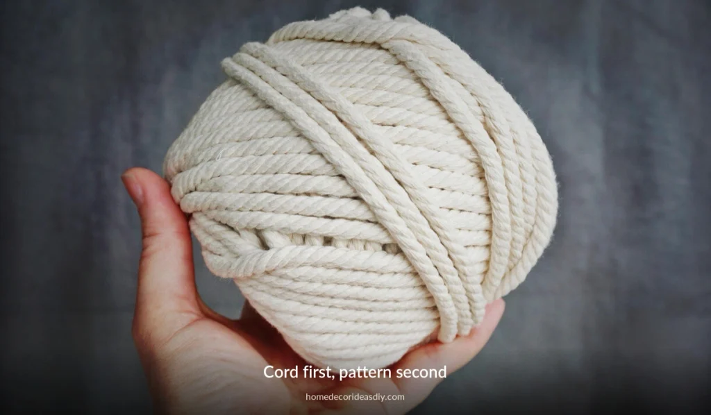 Three-ply twisted cotton macrame cord in a hand, the type that fringes when brushed