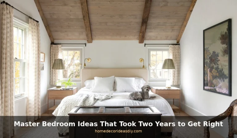 Master bedroom ideas that took two years to get right – cozy warm-lit bedroom with bedside lamps