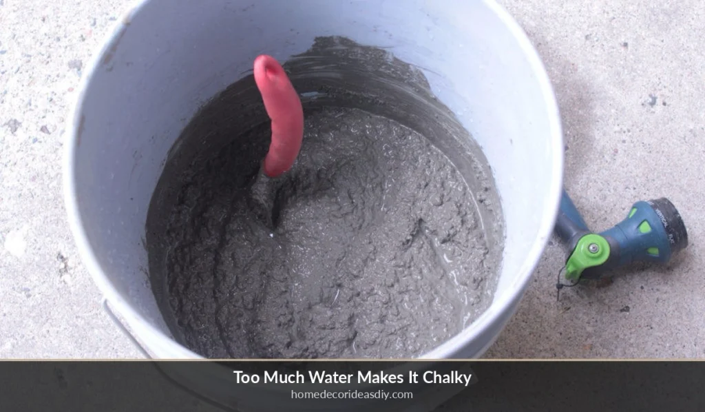 Thick DIY concrete home decor mix in a bucket, porridge consistency not watery