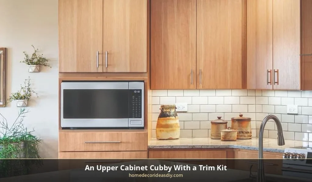 Upper kitchen microwave cabinet cubby with a stainless microwave and wood surround