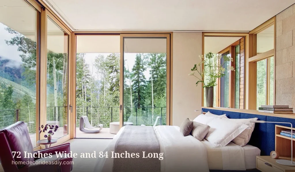 California king bedframe seen from the side, showing the extra length in a long room.