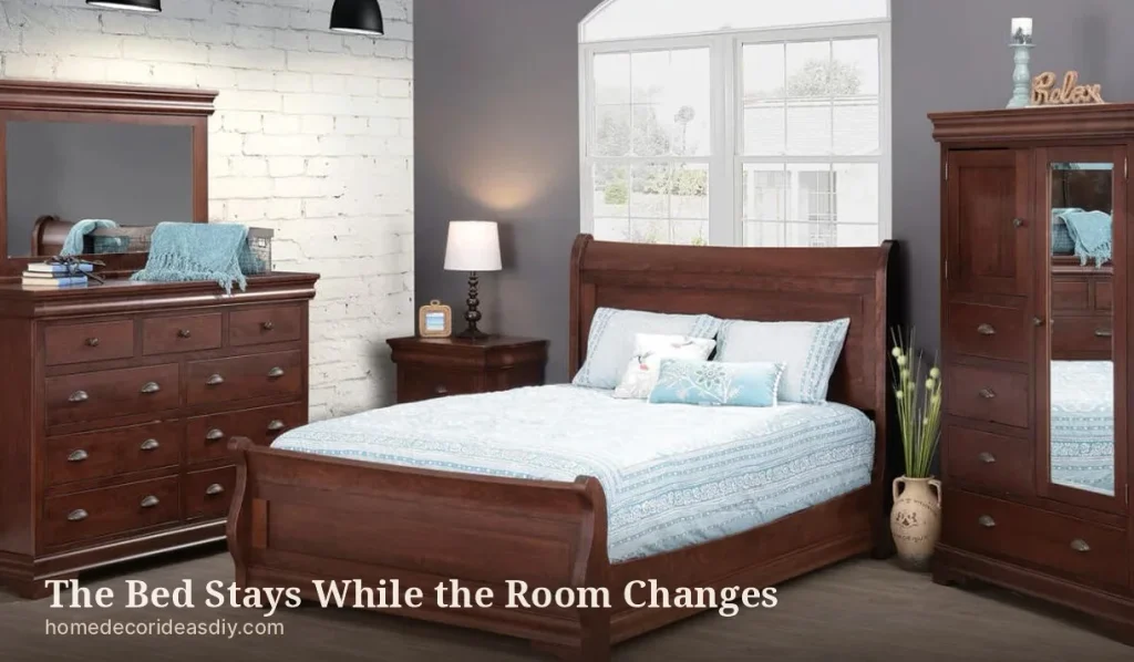 Cherry wood bed frame sleigh style in a cool gray bedroom.