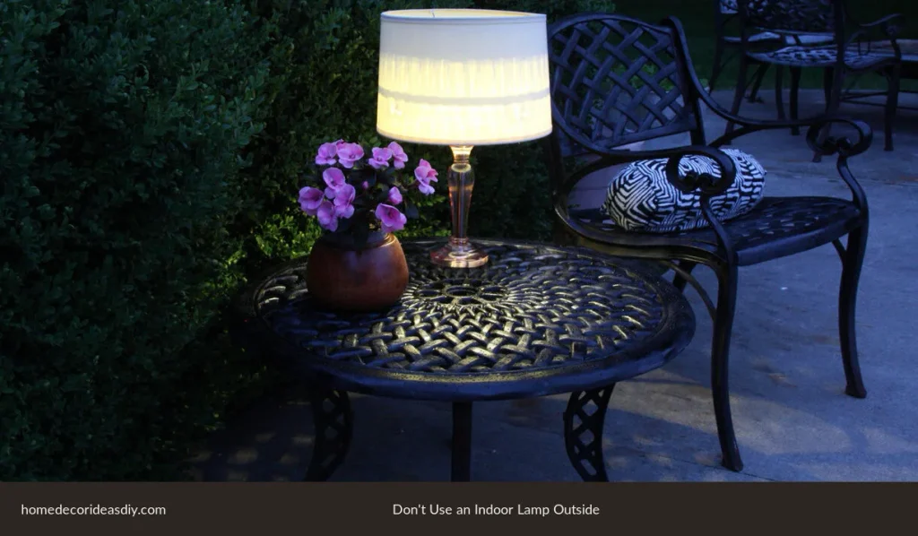 Outdoor table lamps made for a patio a shaded lamp on an outdoor table at night.